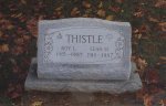 #17 - 2-6 Barre Gray granite - A flower design with scroll work